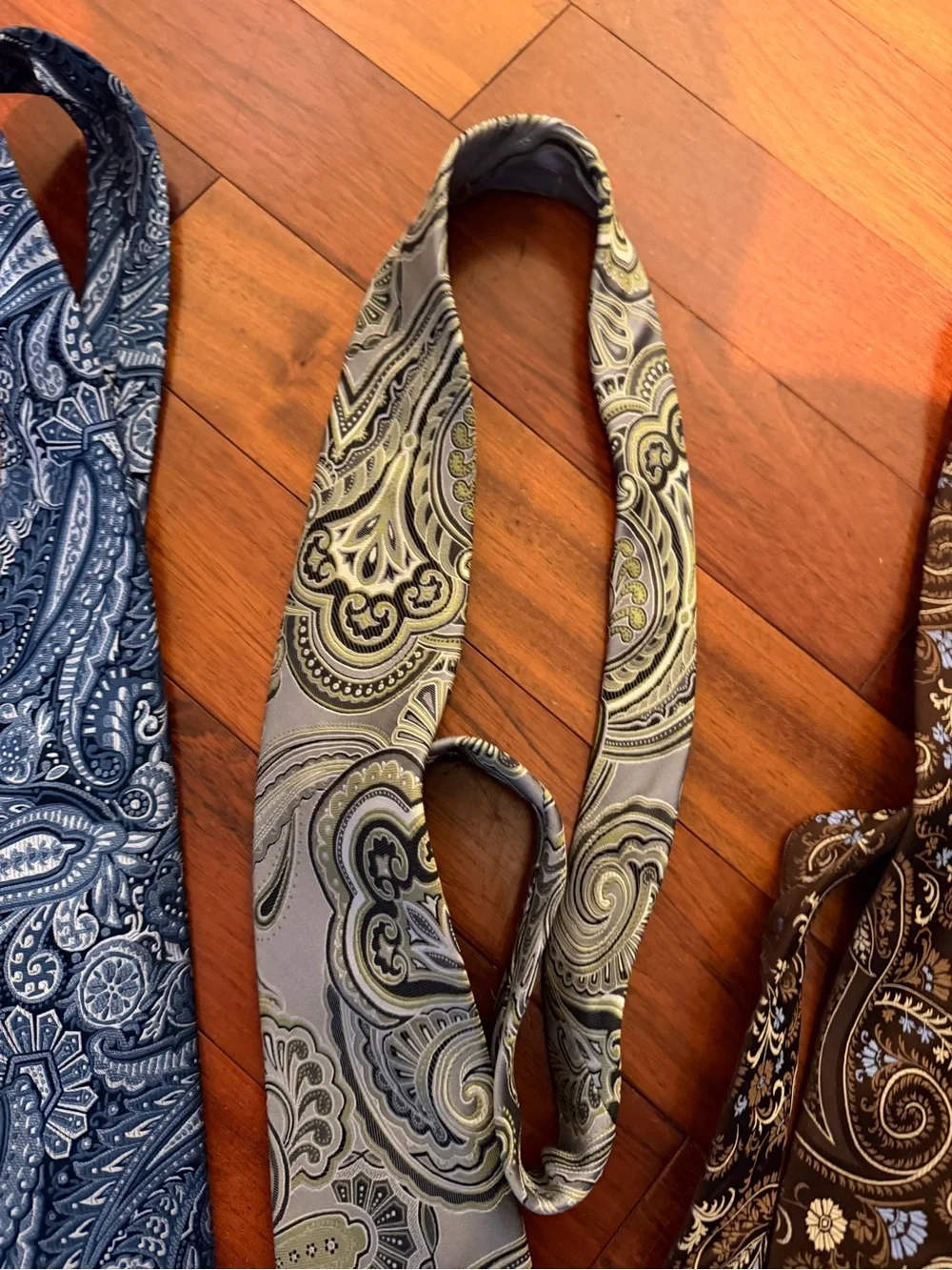 Four Ties including Geoffrey Beene and Paisley Silk
